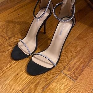 Never worn. Size 10 heels.